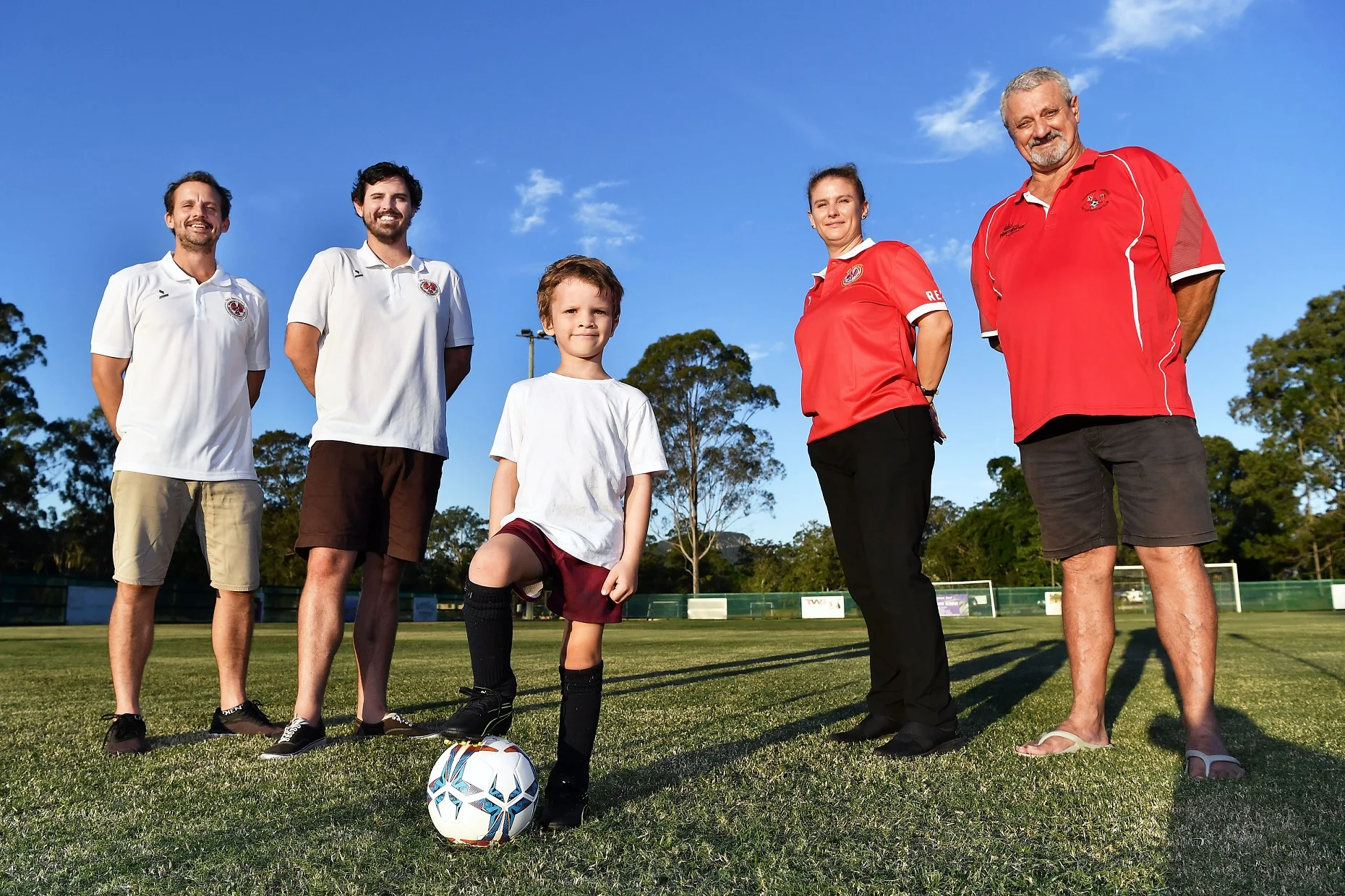 (Left to right) Three generations of another passionate Reds family: Quinn O’Keefe, Lachlan O’Keefe, Jack O’Keefe, Bonnie O’Keefe and lifetime NYU Football Club member Peter O’Keefe.