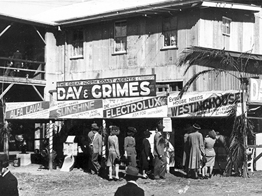 Show patrons entering the pavilion during the annual show, Nambour, late 1930s. The show pavilion was built in time for use in 1922 at a cost of $2,750 pounds. It has subsequently been renovated on several occasions.