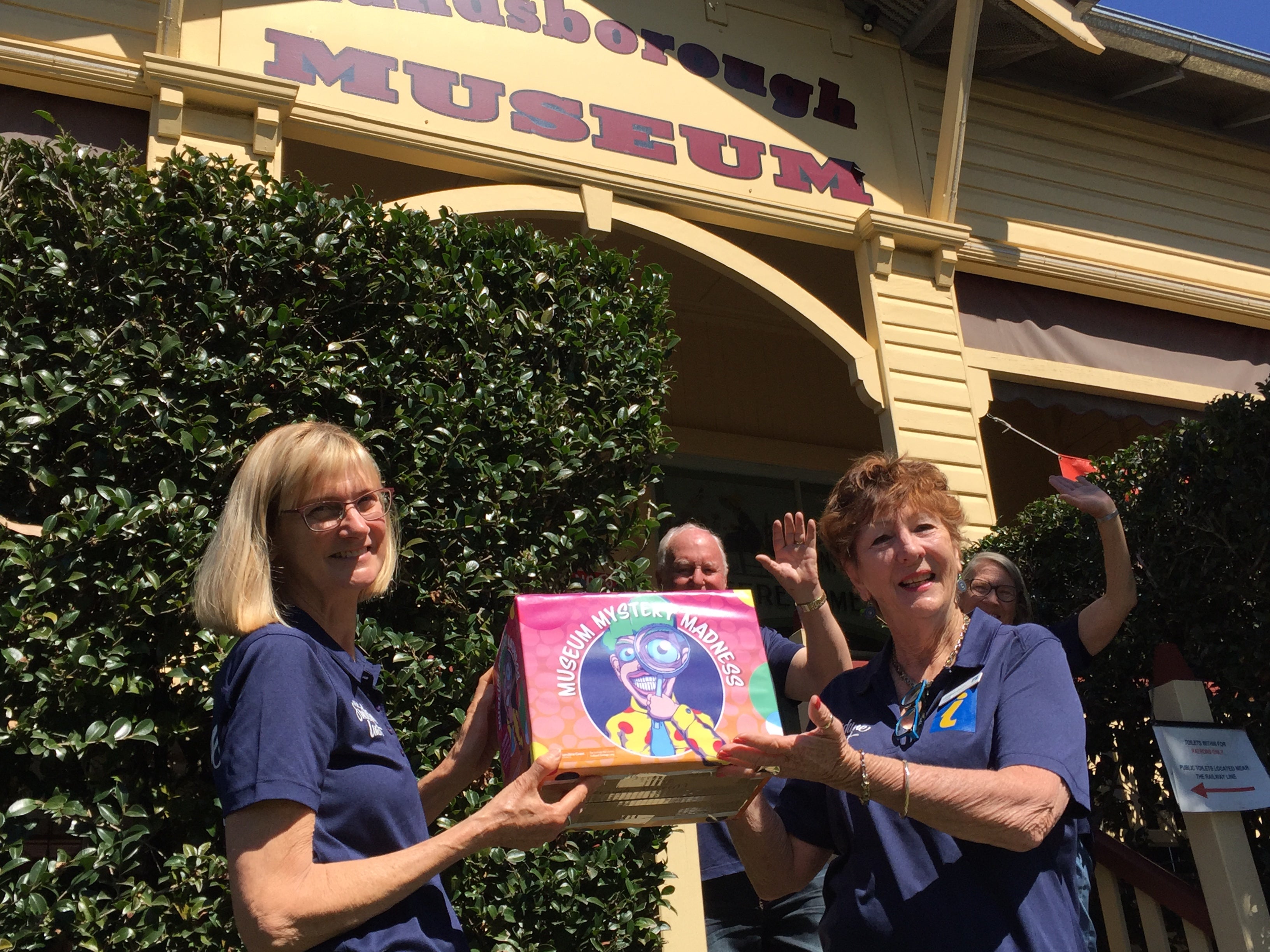 Ladies at Landsborough Museum holding the quiz box