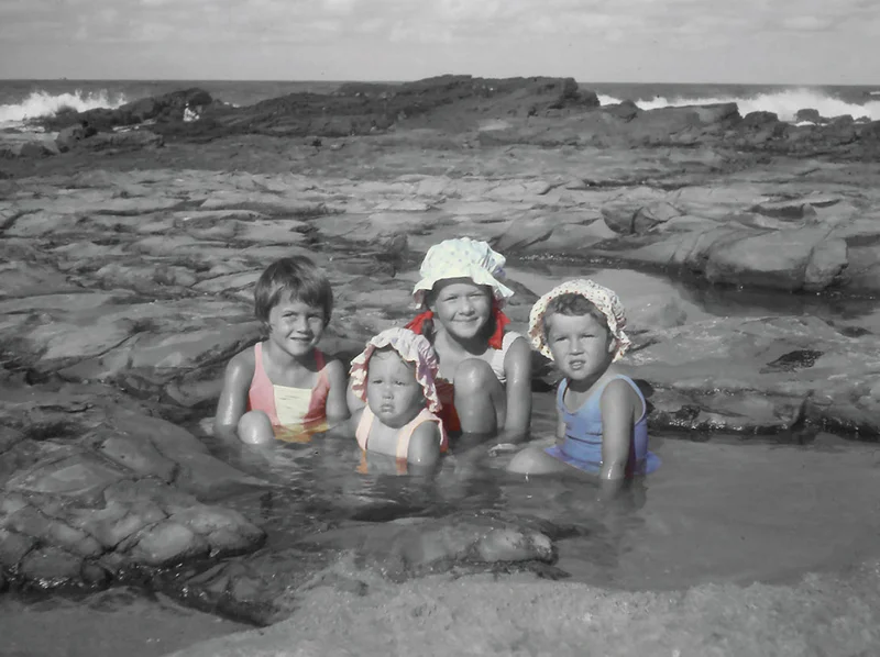 May: Family and friends in rock pools, Mooloolaba, 1967. Courtesy: Bruce Tallon.