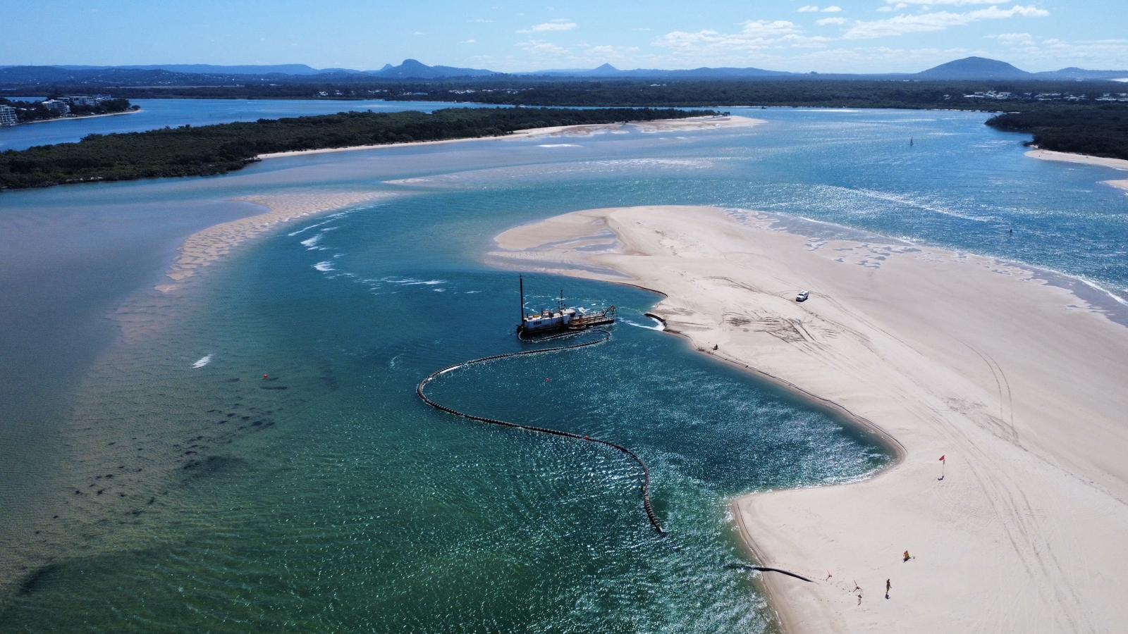 View of the dredge sitting offshore