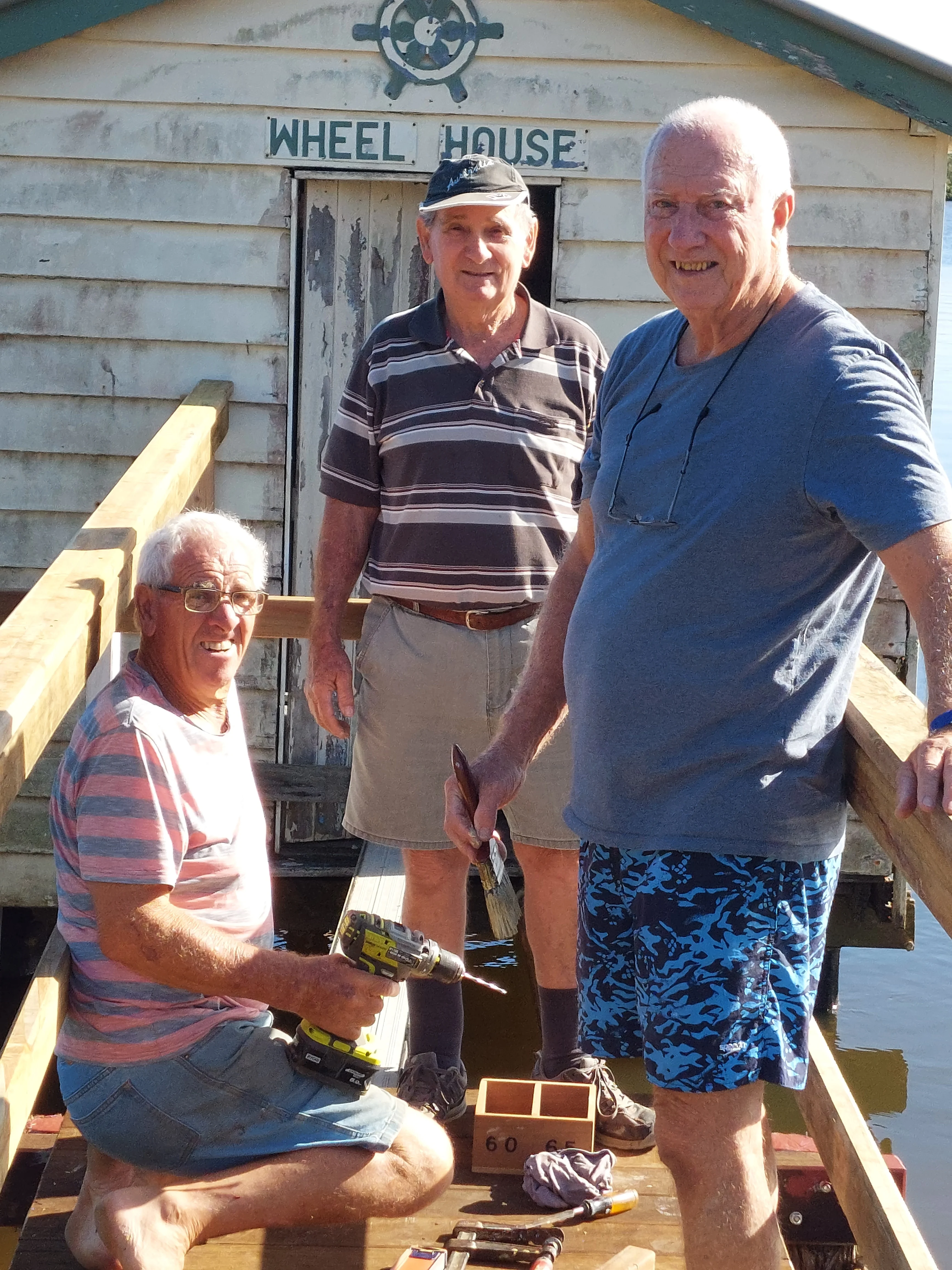 Volunteers from the Buderm Mens Shed restore Maroochy Wheel House