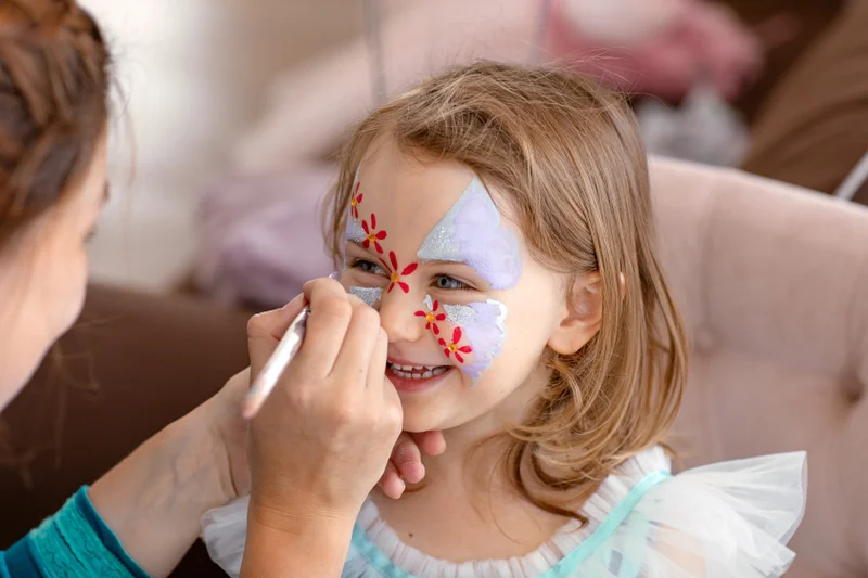 Face painting for little adventurers.