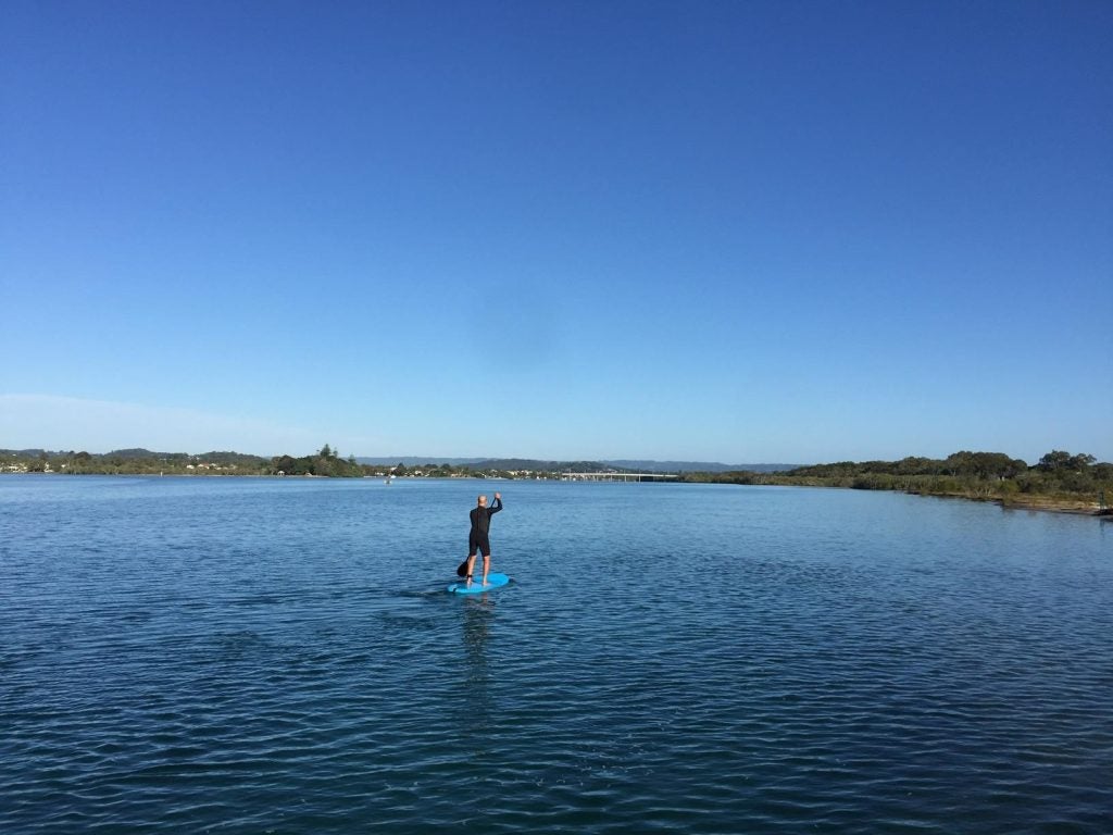 Stand up paddle boarding on the Maroochy River, near Goat Island.
