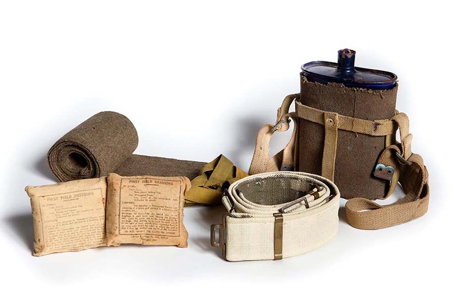 Australian Army standard issue kit items – Pattees, First Field Dressing Packages, Water Bottle in Carry Case - Landsborough Historical Museum Collection
