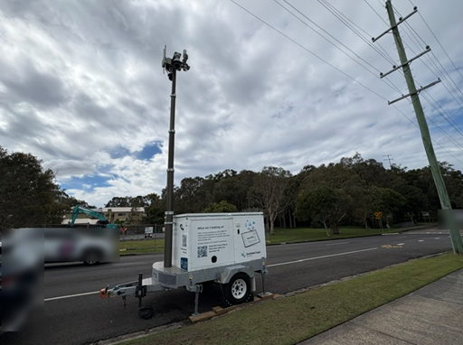 Data trailer parked on side of road
