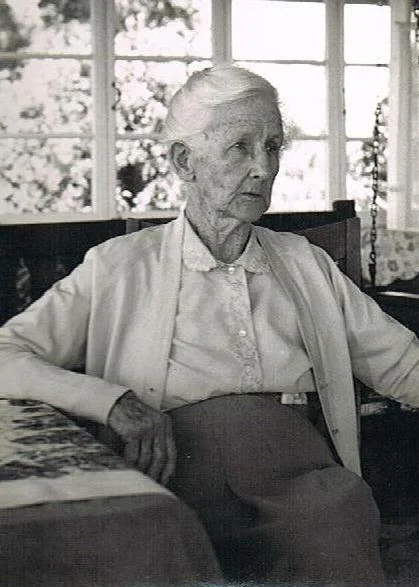 Bessie on the front verandah of her cottage 91yr Photo courtsey B. Watson.jpg