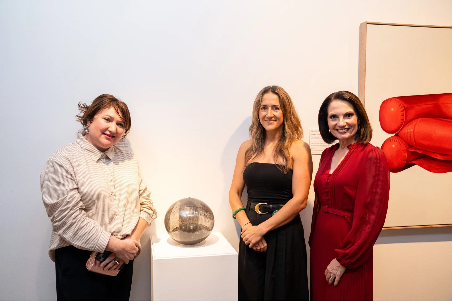 Claire Sourgnes, guest judge, artist Erin Conron and Mayor Rosanna Natoli with 3D Excellence Award winning artwork 'Parallax Series, Sphere #1'. Photo by Patrick Want, Volere Studio.